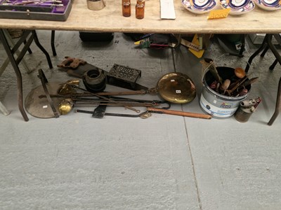 Lot 613 - An iron handled brass warming pan, a brass...