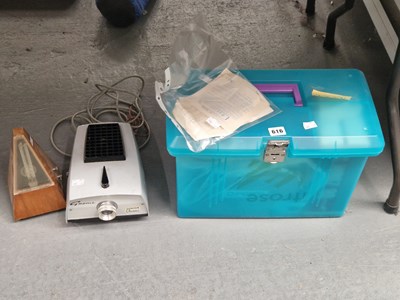 Lot 616 - A metronome, a Gnome slide projector, together...