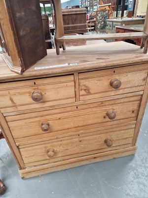 Lot 379 - An antique pine chest of two over two drawers...