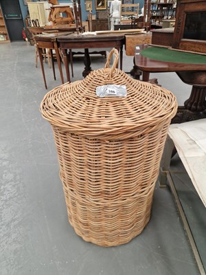 Lot 386 - A large circular wicker lidded basket H 83 Ø 53cm