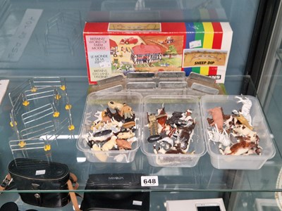 Lot 648 - A boxed Britains sheep dip, together with...
