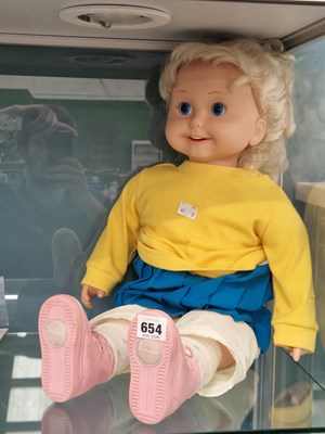 Lot 654 - A Playmates plastic girl doll
