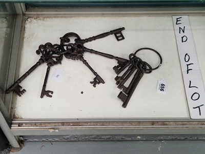 Lot 656 - Two rings of five iron keys