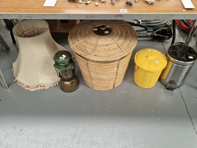 Lot 683 - An oil lamp, a coiled bamboo cane basket and...