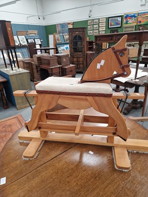 Lot 399 - A vintage pine rocking horse H 69cm