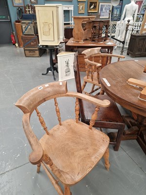 Lot 401 - Two elm seat bow back chairs with turned...