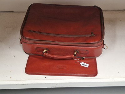 Lot 695 - A brown Texler brief and suit case