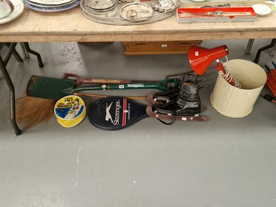 Lot 702 - A pair of skates, a garden fork and a spade, a...