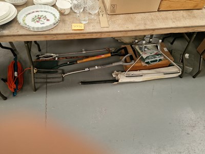 Lot 704 - A shooting stick, a garden fork and a spade, a...