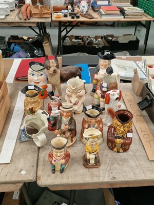 Lot 706 - A collection of Toby jugs, together with two...