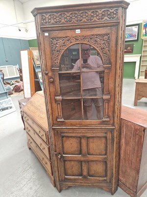 Lot 419 - A 20th century double corner cabinet with an...