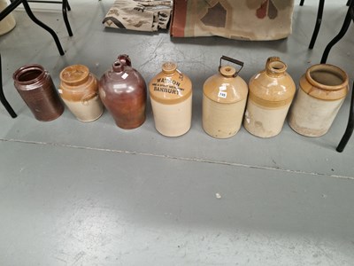 Lot 745 - Seven stoneware jars and ewers to include one...