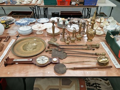 Lot 770 - A graded set of Middle Eastern brass ewers,...