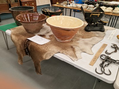 Lot 776 - A brown and white cow hide stamped Argentina...