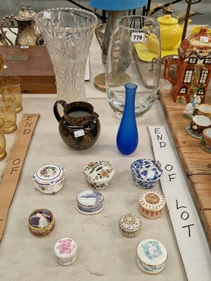 Lot 779 - An ochre printed brown jug, three glass vases,...