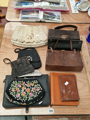 Lot 789 - Seven handbags, two folders, and a leather wallet