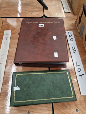 Lot 807 - An album of first day covers together with two...