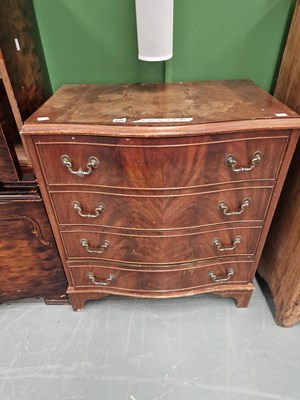 Lot 446 - A 20th century mahogany serpentine chest of...