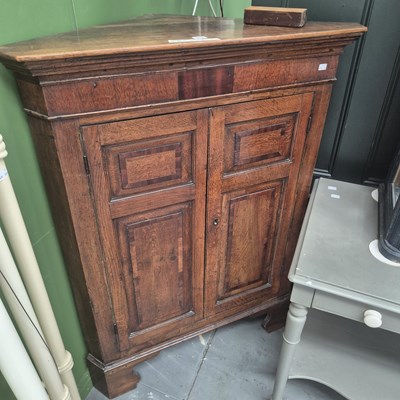 Lot 452 - A Georgian oak crossbanded twin panelled door...