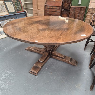 Lot 465 - A bespoke quality circular oak pedestal dining...