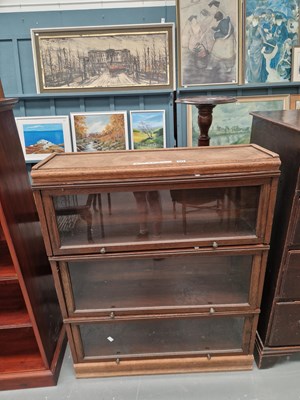Lot 223 - A three tier oak sectional barrister's...