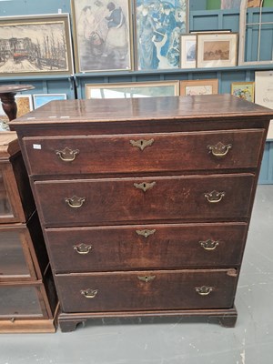 Lot 222 - A 19th century oak chest of four graduated...