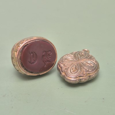 Lot 179 - An antique gold seal fob with a carnelian face...