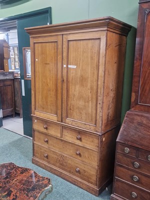 Lot 7 - A 19th century mahogany linen press with doors...