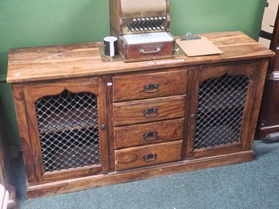 Lot 8 - An exotic hardwood side cabinet with the...