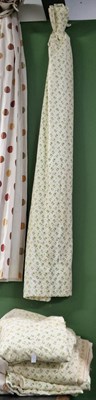 Lot 24 - Interlined curtains, green sprigs on a cream...