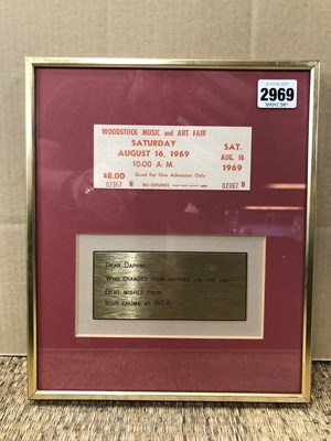Lot 2969 - A framed Woodstock Festival ticket; A ticket...