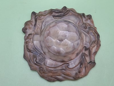 Lot 1870 - A moulded watery rosette of brown cloud...