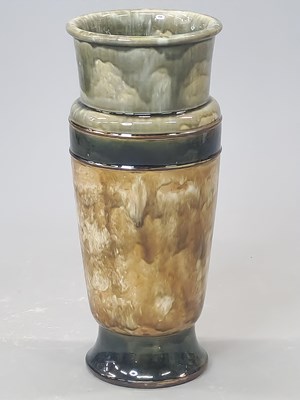 Lot 1871 - A Doulton stoneware vase glazed in four bands...