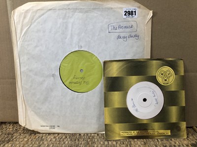 Lot 2981 - Two white-label records from the ' 80s band...