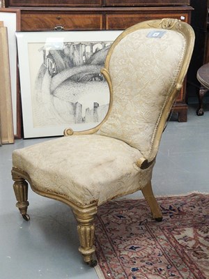 Lot 52 - A Victorian gilt show frame armchair with...