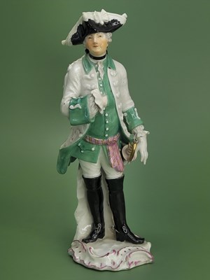 Lot 1873 - A Meissen figure of a gentleman wearing a...