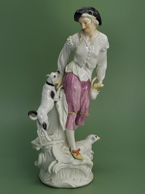 Lot 1879 - A Meissen figure of shepherdess wearing pink...