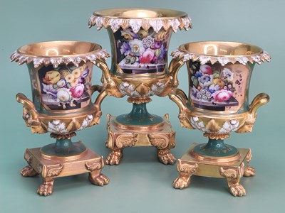 Lot 1882 - An apple green ground garniture of three early...