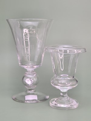 Lot 1884 - A Steuben clear glass urn with a roll over rim....