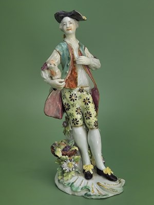 Lot 1886 - A patch mark Derby figure of a gentleman...