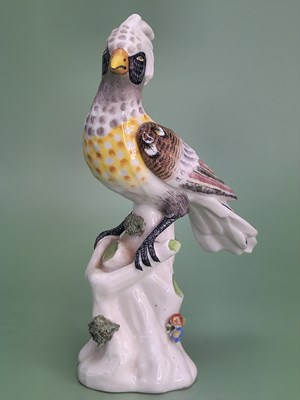 Lot 1887 - A pair of Dresden exotic birds perched on tree...