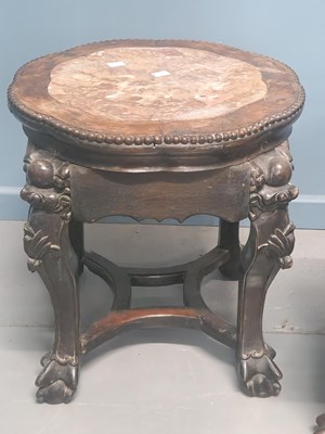 Lot 57 - Two Chinese hardwood stands with pink marble...
