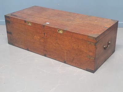 Lot 61 - A brass bound mahogany trunk, the rectangular...