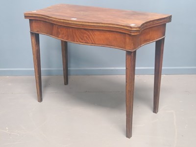 Lot 63 - A George III mahogany tea table, the...