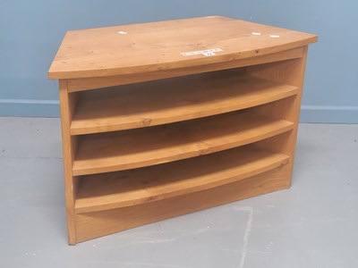 Lot 72 - An oak bow fronted unit of three open shelves,...