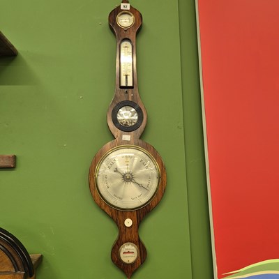Lot 92 - An early 19th-century rosewood wall barometer...