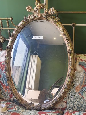 Lot 5a - A 19th century oval wall mirror with...