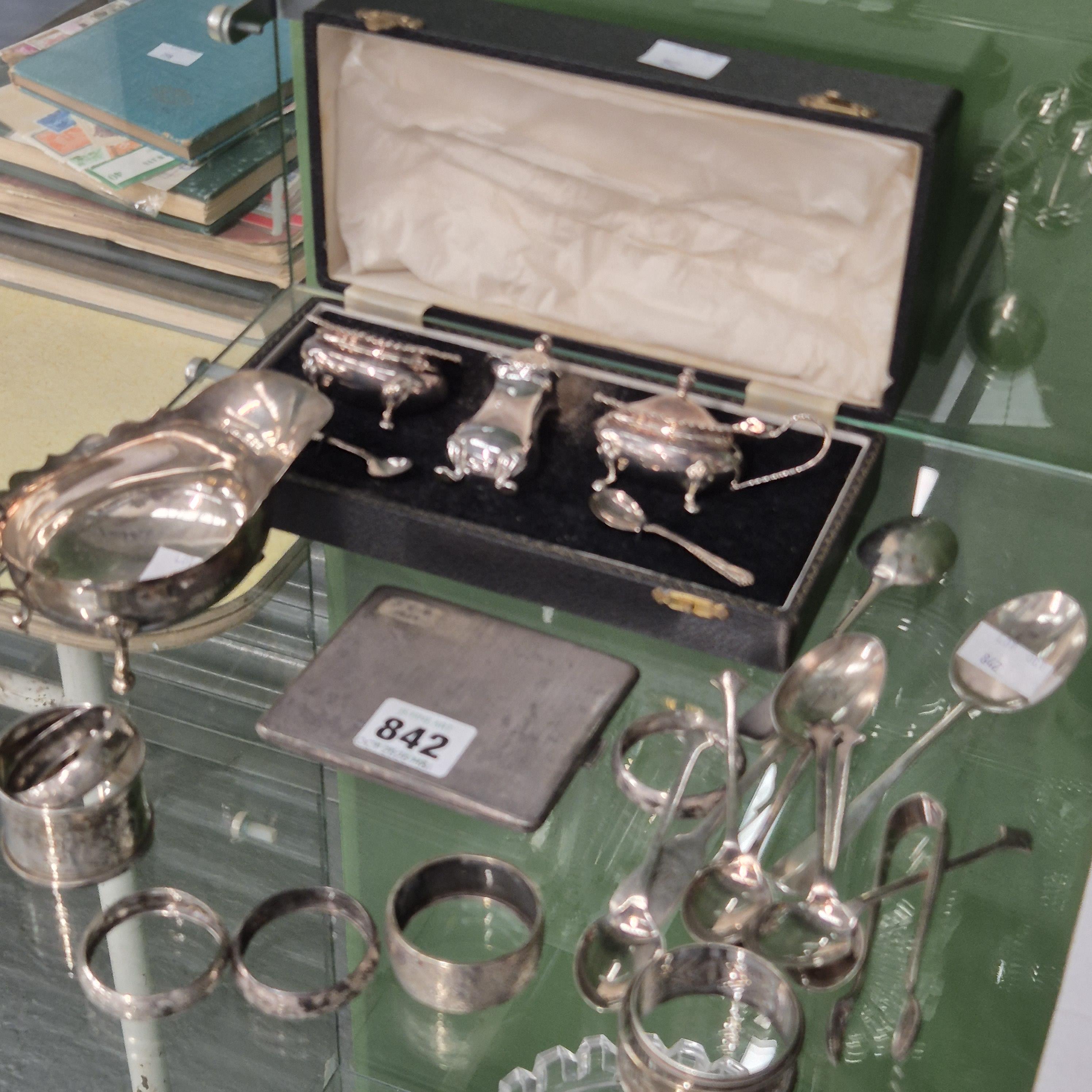 Lot 842 - A boxed silver three piece cruet set, silver